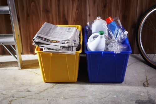 Various types of furniture being cleared in a Wood Green home